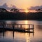 The broken timber jetty at Gorokan on the Budgewoi Lake is bathed in glorious co...