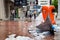 Broken umbrella and overflowing rubbish bin after a tropical storm in Hong Kong