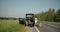 Broken wheel man changing tire help two girls