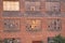 Broken windows of an abandoned brick factory building, South Bend, Indiana