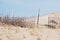 Broken wooden fence on the beach