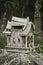 Broken wooden spirit house in thailand