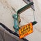 Broken yellow sign above an abandoned and derelict photography shop in madeira portugal the sign reads in english, picture