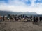BROMO, INDONESIA - JULY 12, 2O17 : Tourists hiking up to the top of Mount Bromo, the active mount Bromo is one of the