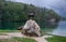 Bronse statue of legendary deer Zlatorog (The Golden Horn) under rain. Lake Bohinj. Slovenia