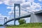 The Bronxâ€“Whitestone Bridge. a suspension bridge, carries traffic over the East River from Bronx to Queens, NYC