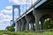 The Bronxâ€“Whitestone Bridge. a suspension bridge, carries traffic over the East River from Bronx to Queens, NYC