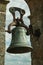 Bronze bell with details carved on the surface at the Castle of Trujillo