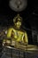 Bronze buddha statue at Bangkok temple in Thailand in Asian culture and religion concept