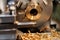 The bronze bushing is installed in the chuck jaws of the lathe and is processed with a mechanical cutter, removing the chips and