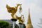Bronze casting Thai literature swans carrying bell-shaped electricity lantern painted with gold colour