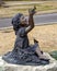 Bronze of Child with Butterflies in Elena`s Childrens Park at Christmas in University Park, Texas