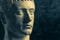 Bronze color gypsum copy of ancient statue of Germanicus Julius Caesar head for artists on dark textured background