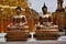 Bronze colored Buddha statues at Wat Doi Sethep.