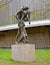 Bronze figures of Romeo and Juliet in front of Delacorte Theater in Central Park on sunny spring day. New York City