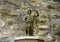 Bronze of Jesus feeding the multitude, Church of Santa Margherita d`Antiochia in Vernazza, Liguria, Italy