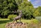 Bronze life-size statue of a Texas red stag deer in the Port of Jefferson Nature and History Preserve in Jefferson, Texas.