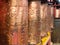 Bronze prayer wheels, spinning Buddhist prayer drums at The Putuo Zongcheng Buddhist Temple