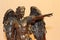 Bronze sculpture of Archangel Michael with wings and sword