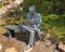 Bronze sculpture of a business man at the Municipal Building in Stillwater, Oklahoma.