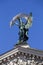 Bronze sculpture genius with gold palm branch and wings on the roof of the opera and ballet theatre in Lviv, Ukraine