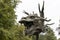 Bronze sculpture of a head of a dragon in YSP.