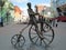 Bronze sculpture merchant on a Bicycle on the street Weiner Ural Arbat in Yekaterinburg