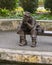 Bronze sculpture of an old man fishing by Gary Price at the Dallas Arboretum and Botanical Garden