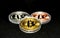 Bronze, silver and gold bitcoins in protective case