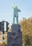 Bronze statue of bearded man on granite base, Amsterdam, Netherlands