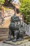 Bronze statue of a lion komainu mythological guardian in Japan