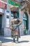 Bronze statue of a market woman at Dolac Market. Statue of Kumica Barica. Sculpture of woman with basket on her head
