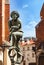 Bronze statue of a poor student near St Mary`s Basilica located in Krakow, Poland