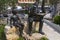 Bronze statue, soldier reading boy from book, in Torri del Benaco