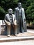 Bronze statues in a park of Karl Marx and Friedrick Engles