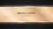 Bronze ticket. Luxurious invitation. Bronze ribbon banner on a black background with a pattern of mesh. Realistic bronze strip wit