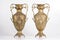 Bronze vases on a white background, ancient jugs of bronze, bronze antique vases front view, vintage vessels studio photo, bronze