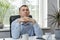 Brooding young man in the office. Portrait of middle-aged director in his own cabinet