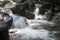 Brook flowing stone steps