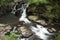 Brook flowing from waterfall