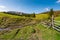 Brook among the grassy slopes in rural area