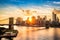 Brooklyn Bridge and the Lower Manhattan skyline at sunset