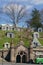 Brooklyn, New York: A trolley waits for passengers below obelisks and mausoleums