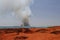 BROOME WESTERN AUSTRALIA/AUSTRALIA SEPTEMBER 26TH : smoke column rises from bush fire north of cable beach