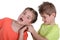 Brother pulling sister\'s hair