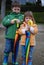 Brother and sister and big umbrellas