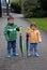 Brother and sister and big umbrellas