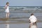 Brother and sister enjoying a beach