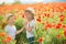 Brother and sister in poppy field
