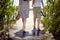 Brother and sister took their shoes off on the dock